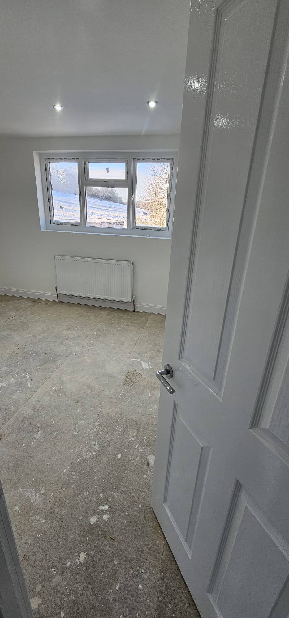 Doorway view into a finished extension living space, Leeds home extension