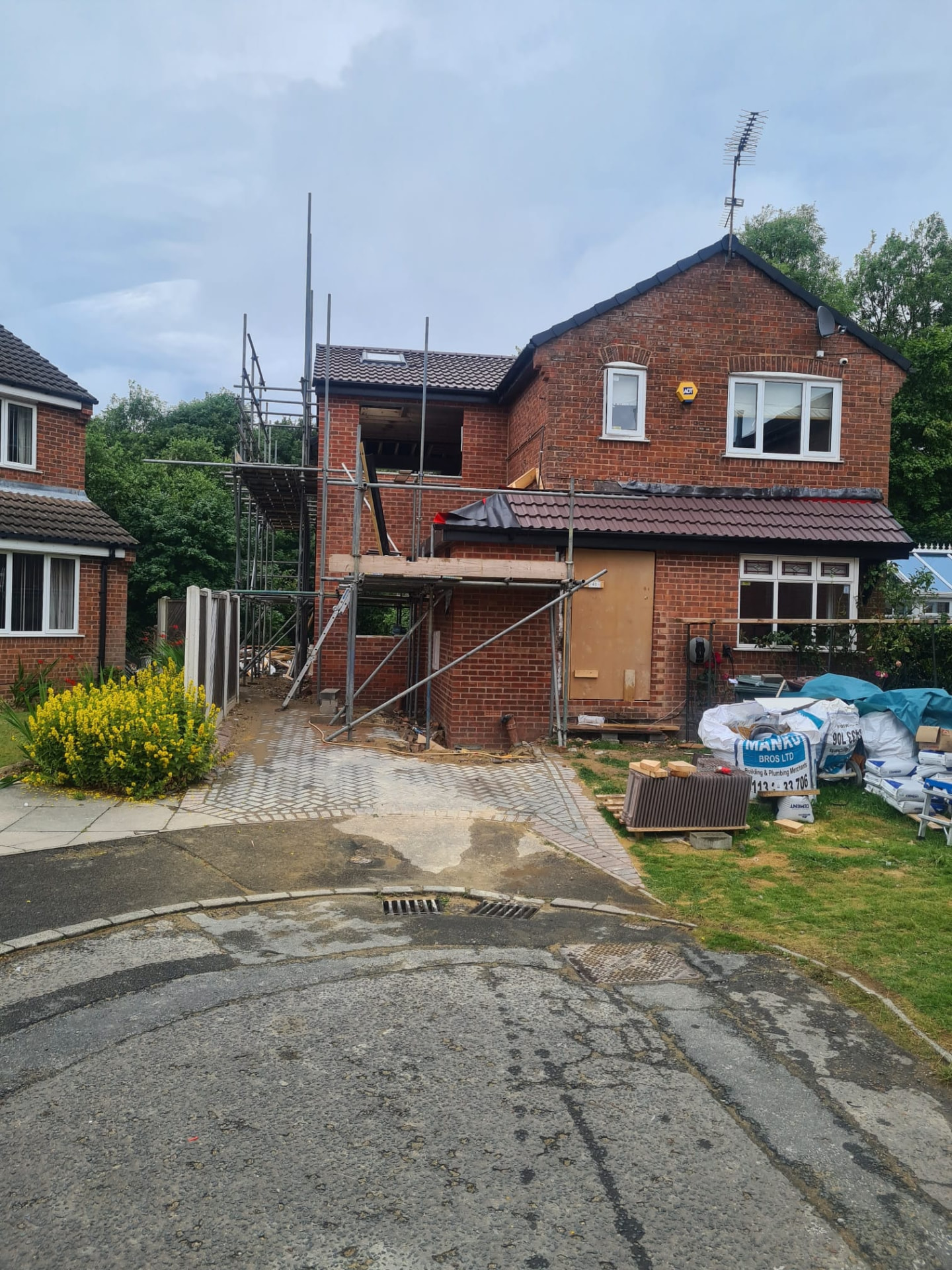 Two-storey side extension and loft conversion under construction in Leeds