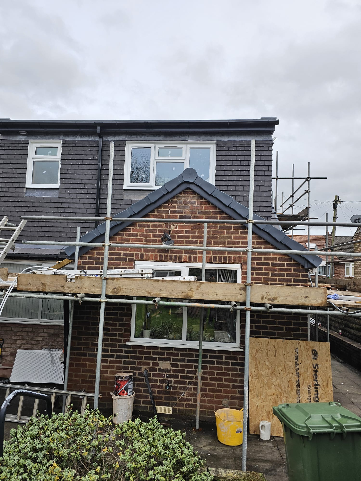 Leeds house extension nearing completion with brickwork and scaffolding